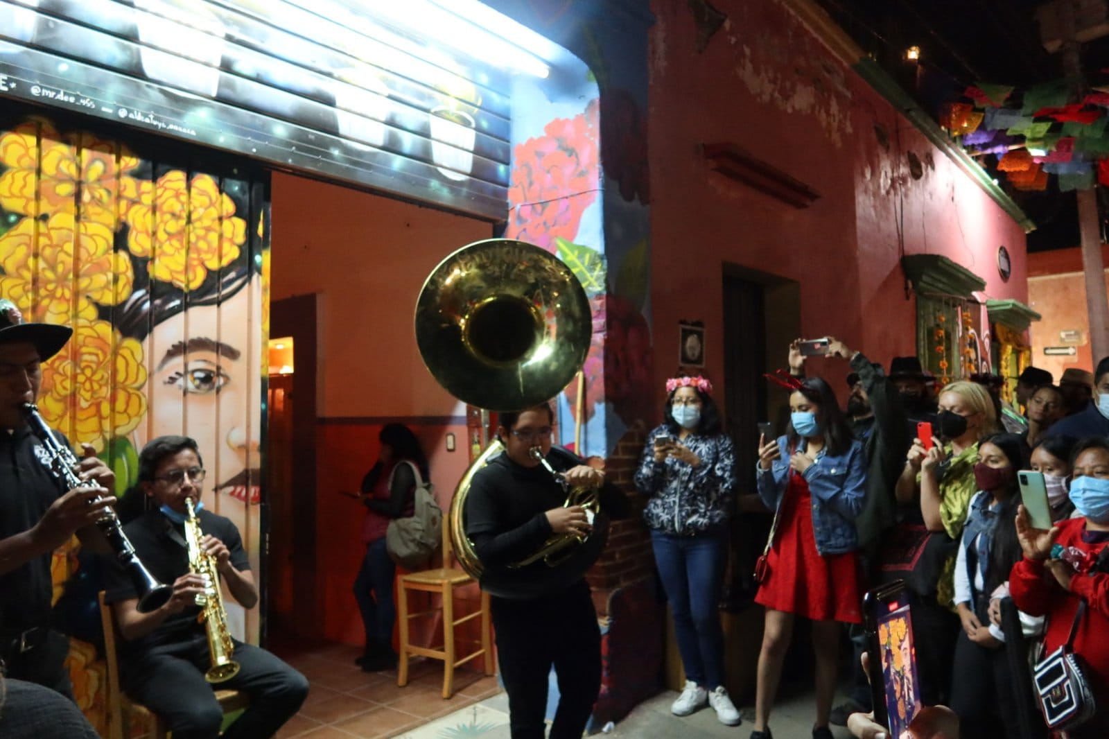 Live brass band performance at Aldea Tuya with guests watching