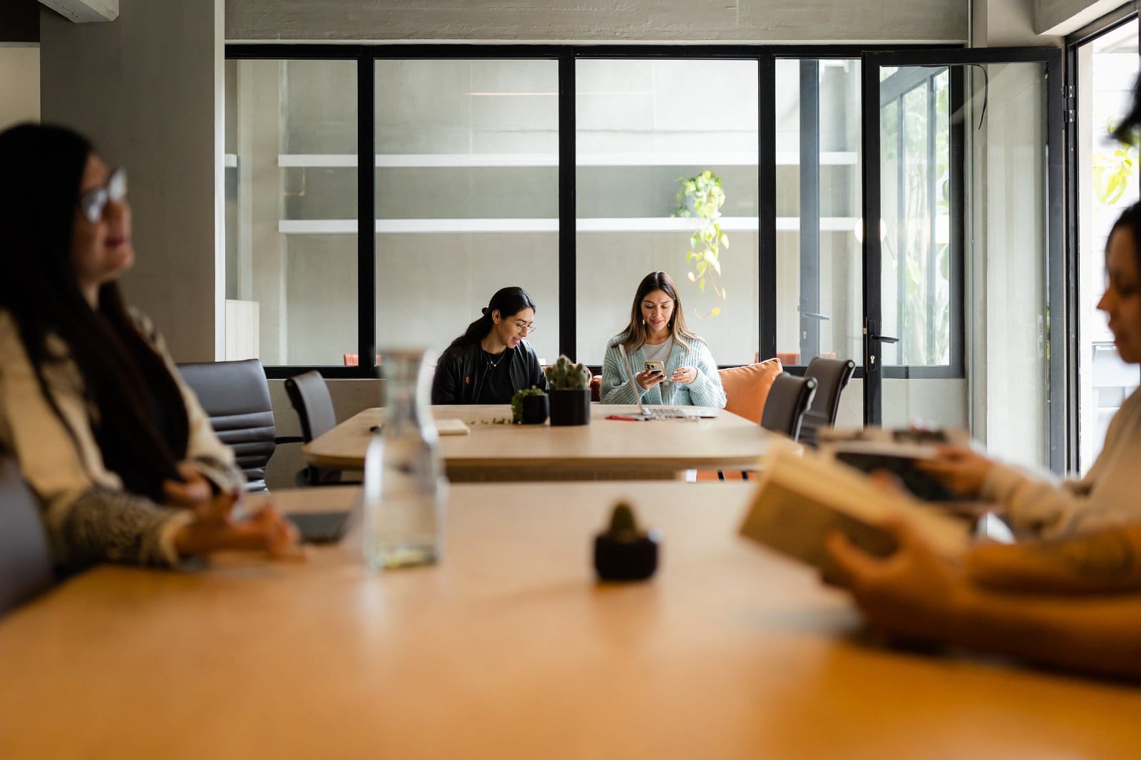 Residents in a meeting in the coworking conference room at Outsite Mexico City Roma Sur