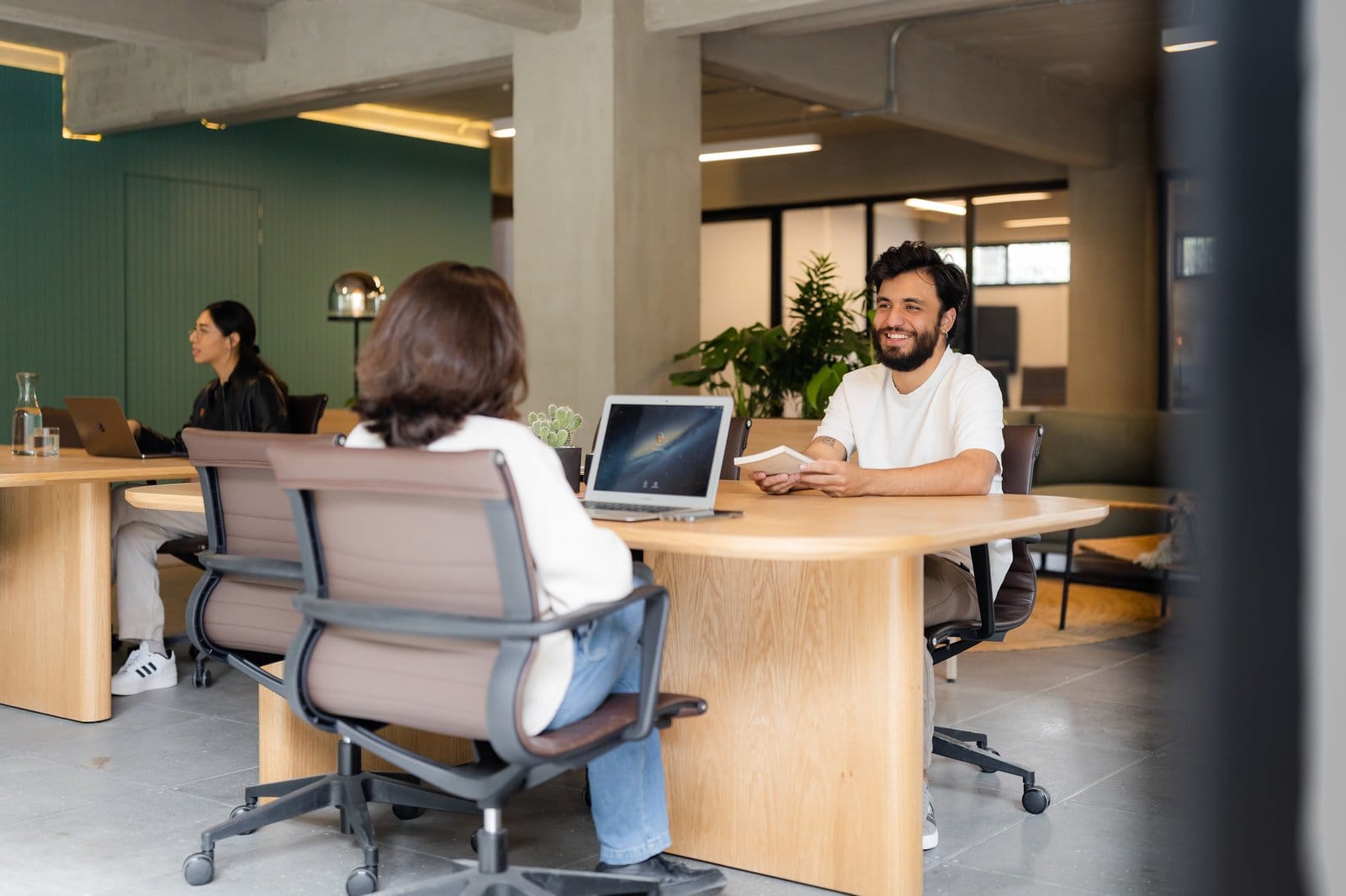 Residents working at laptops in the coworking space at Outsite Mexico City Roma Sur