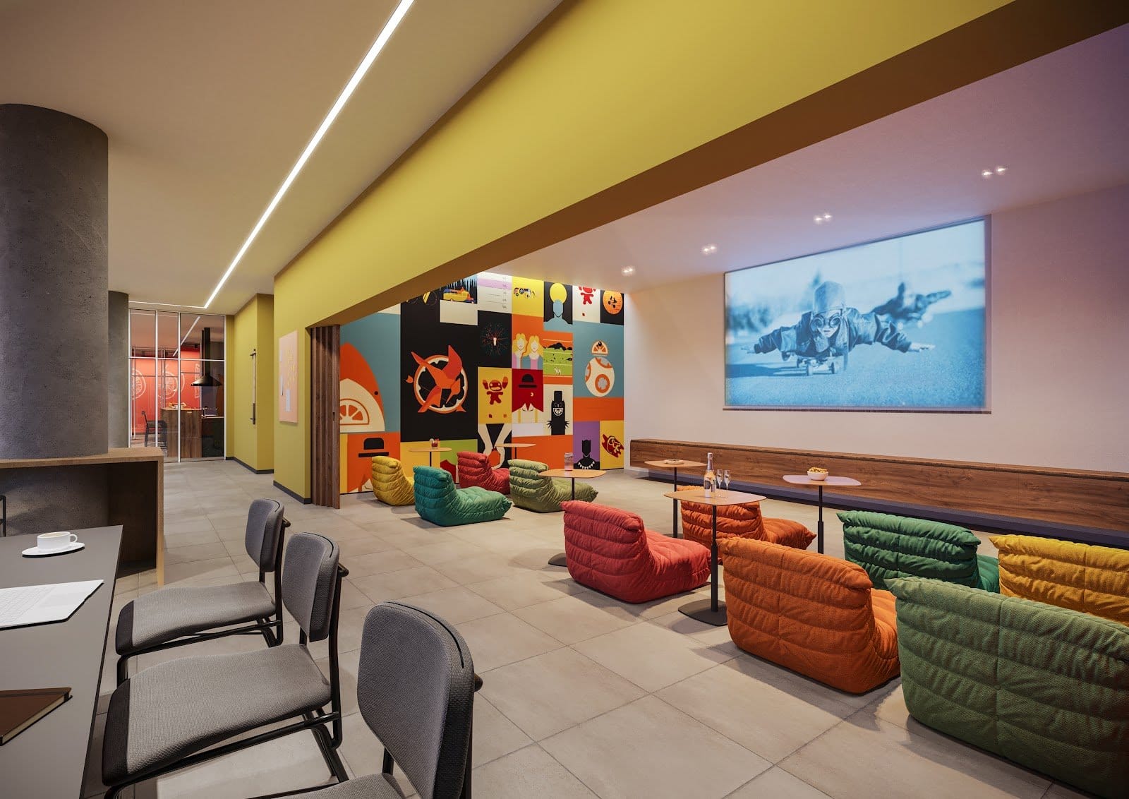 Colorful communal lounge with modular sofas and projector screen at Uliving Campinas student residence