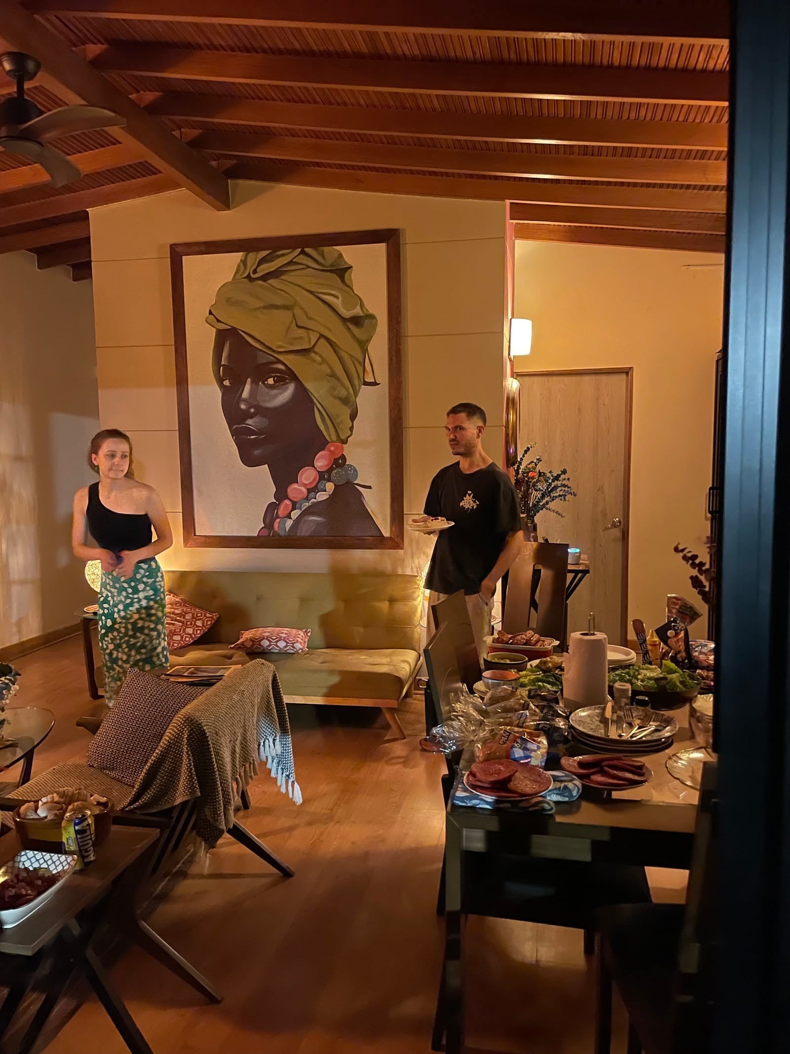 Residents sharing a communal dinner in the lounge at Balu Coliving Medellin