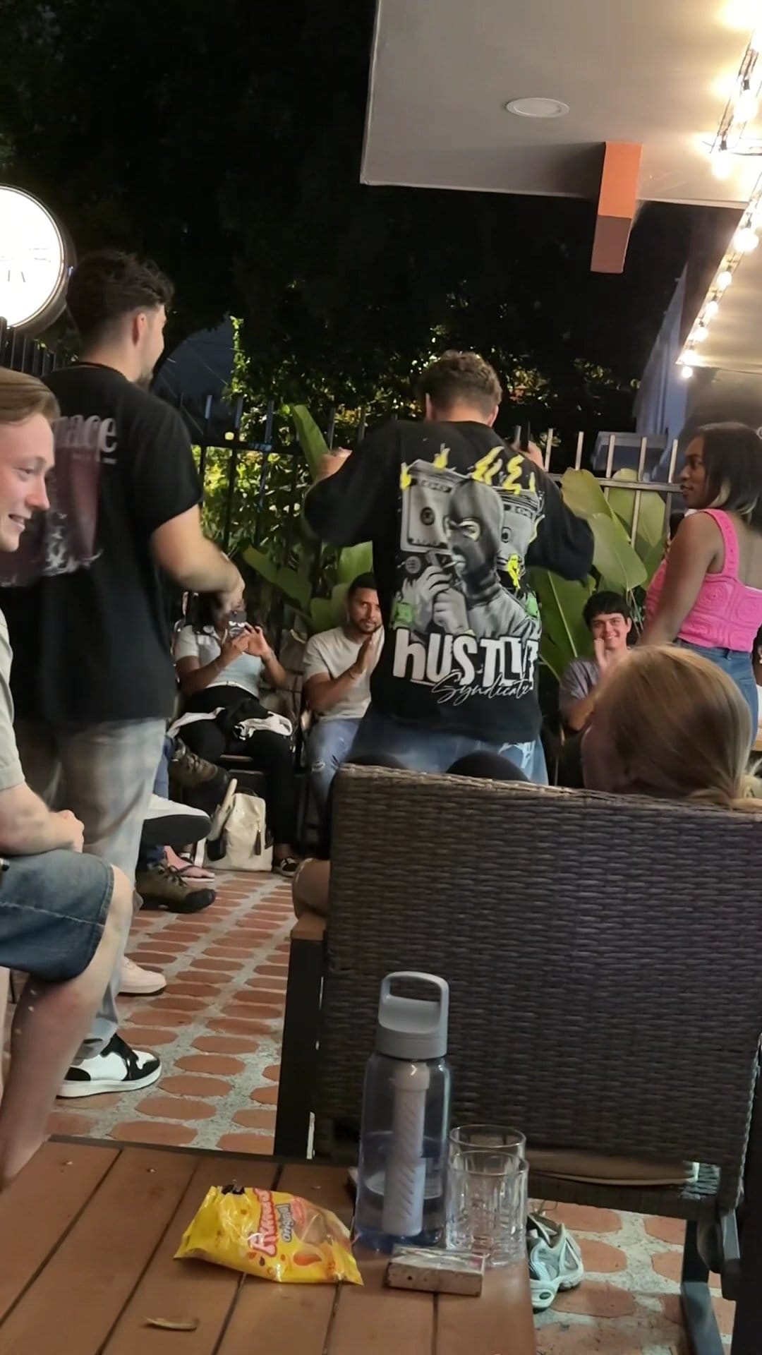 Guests mingling during an evening social gathering at Bohemia Boutique Hostel Cali