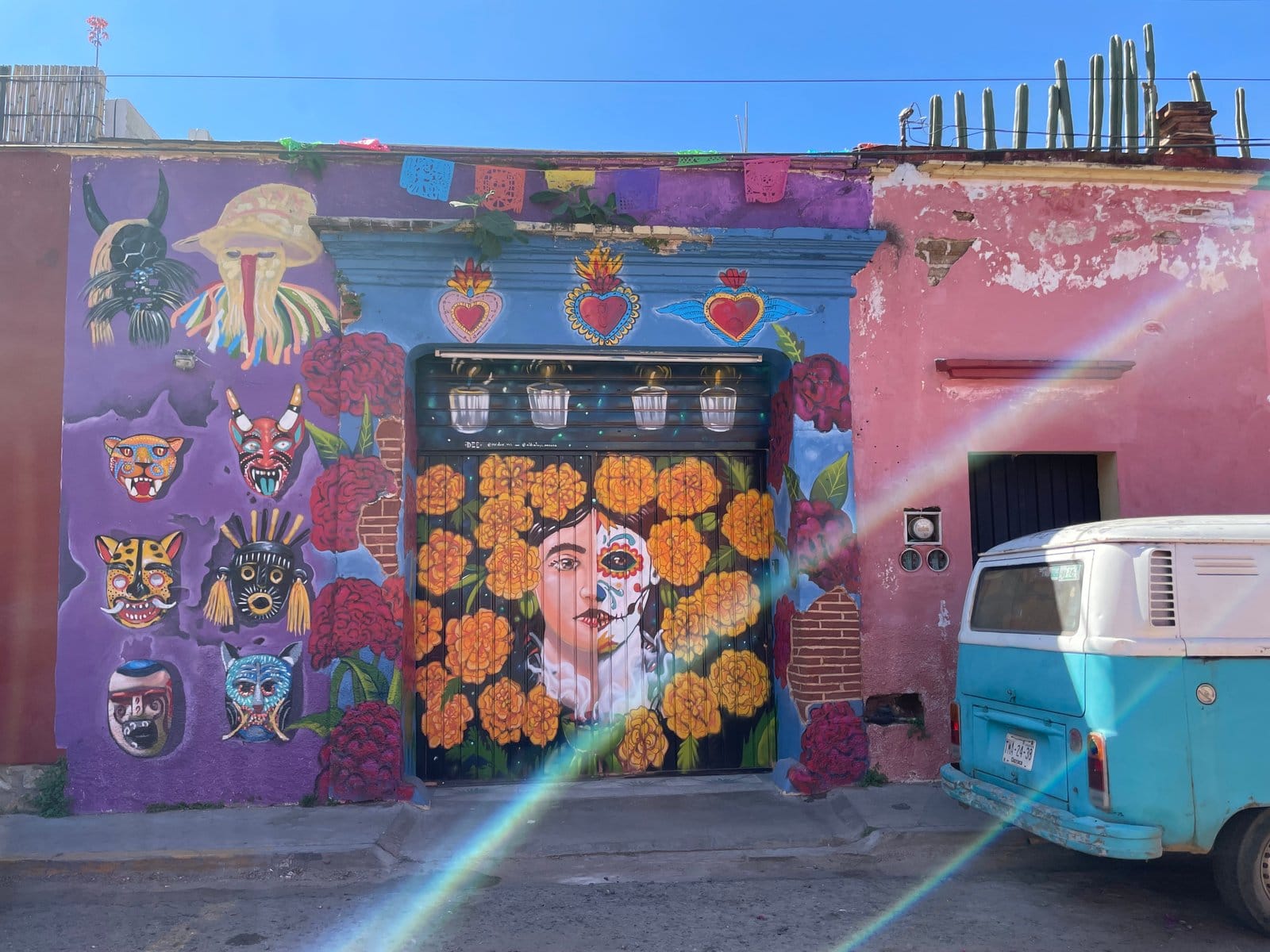 Colorful Frida Kahlo mural and Day of Dead art on the facade of Aldea Tuya, Oaxaca