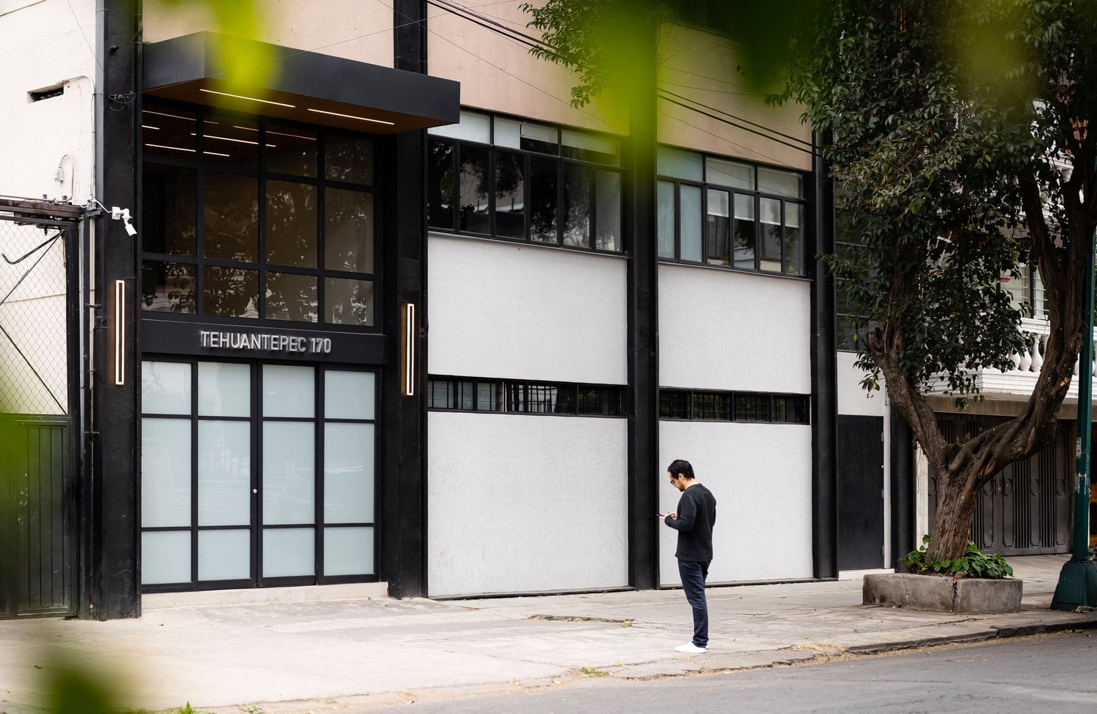Street-level exterior facade of Outsite Mexico City Roma Sur on Tehuantepec 170
